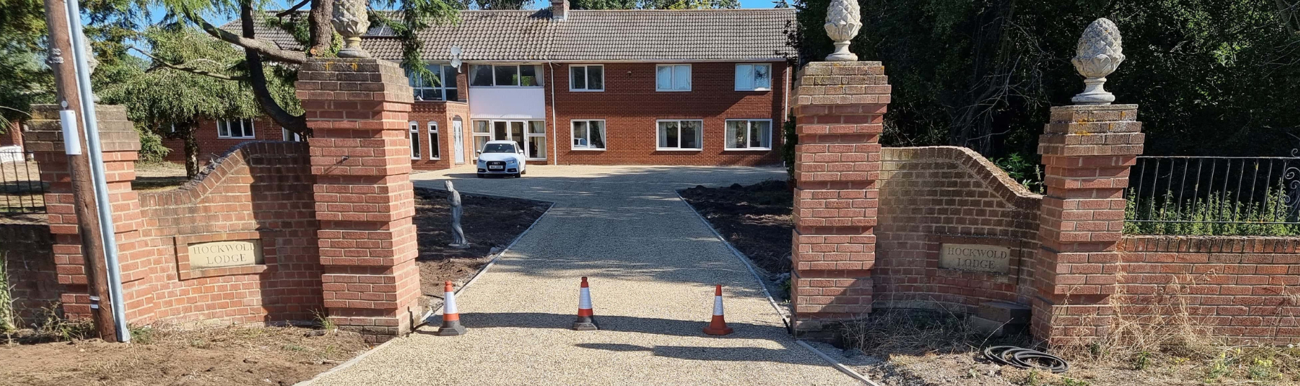 This is a photo of newly installed chip and tar drive by Watton Driveway Solutions
